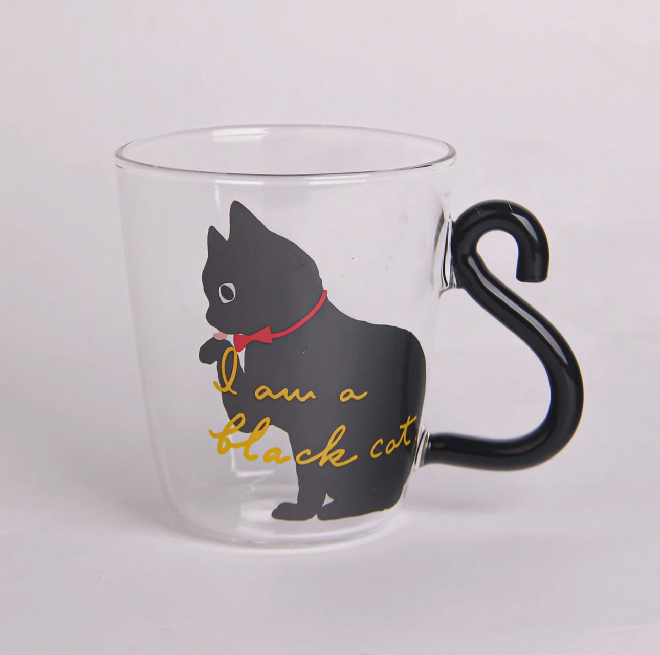 Black Cat Licking Paw Glass Cup